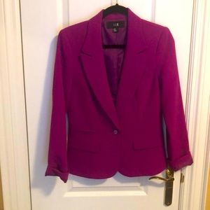 Stunning fitted fuchsia jacket.